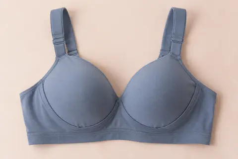 Soutien-gorge minimiseur Wingslove gris bleu, sans armatures, avec bonnets emboîtants et larges bretelles.